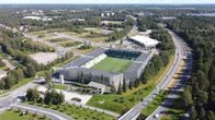En visualisering av en flygbild av Sandvikens stadion där en ny läktare har byggts på den gamla träläktarens plats. Bredvid stadion finns en miniläktare formad enligt den gamla träläktaren.