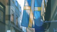 ruotsin lippu kujalla ja päällä teksti "RU"