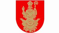 Nousiaisten kunnanvaakuna. Vaakunassa mies pitää sauvaa kädessään. 