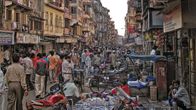 The Bazar in full swing - Bapty Rd, Chor Bazar, Bombay.