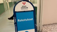 Opaste, ständi, jossa lukee "Rokotukset".