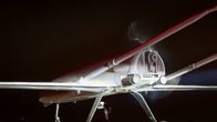Photo of a white Ukrainian AN-196 drone, with a black background.