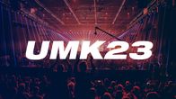 UMK:n yleisöä ja teksti UMK23