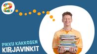 Pikku Kakkosen juontaja Veeti kirjakasa kädessään.
