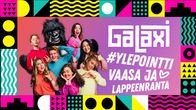 Galaxin juontajat ja gorilla yhteiskuvassa.