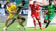 Fyra fotbollsspelare från olika lag tävlar om bollen på en gräsplan; matchtröjor i gult, grönt och rött syns.