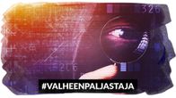 Suurennuslasi ja silmä.