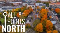 An aerial shot of Vallila with trees in fall foliage.