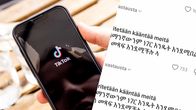 Puhelin, jonka näytöllä näkyy Tiktokin logo ja vieressä on kuvakaappaus amharan kielellä kirjoitetuista kommenteista.