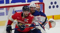 Aleksander Barkov ja Connor McDavid lähikuvassa.