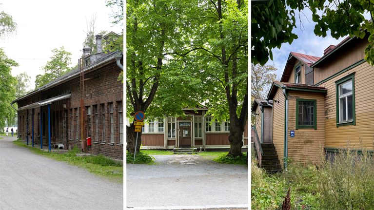 Kolme erilaista puu- ja tiilirakennusta hiekkateiden varrella puiden ympäröimänä, yhdessä talossa esteettömyyskyltti.