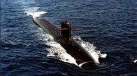 A submarine visible on the water.