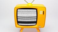 Retro tv-apparat med brusig bild