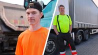 Kaksi kuorma-autonkuljettajaa seisoo autojen edessä.