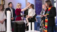 Elina Vaittinen kastaa kolmivuotiaan Ansan.