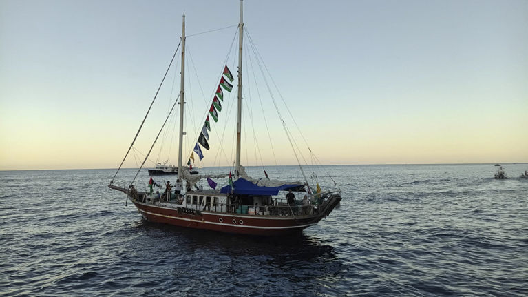 A sailing ship at sea.