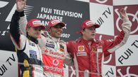 Heikki Kovalainen ja Kimi Räikkönen samaan aikaan palkintokorokkeella.