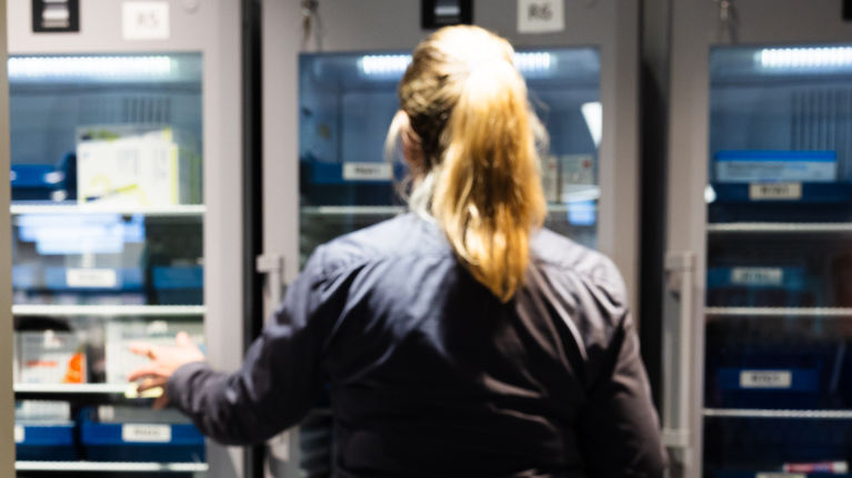 Women collecting prescription medication.