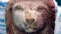 Aslan -leijona, Narnia-sarjan hahmo, veistetty tammesta, kuvattu Walt Disney World' ssä.