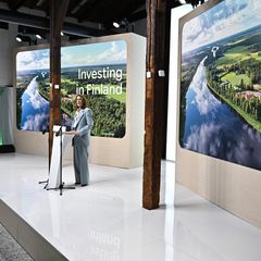 Google's Chief Investment Officer Ruth Porat speaking at a press conference in Helsinki.
