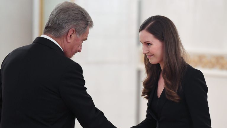 President Sauli Niinistö och statsminister Sanna Marin på presidentens slott den 10 december 2019.