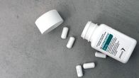 An open bottle of pills.