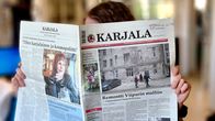 Karjala sanomalehteä luetaan.