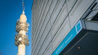 Yle's media house entry with link tower in the background.