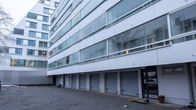 Kerrostalo, jossa on haettu tupakointikielto koko tontille ja rakennukselle.