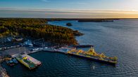 A port in Pärnäinen, in the Tuku archipelago. Sunset in the background.
