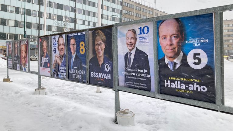 Campaign posters for candidates in the 2024 presidential election.