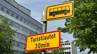 Linja-autopysäkin liikennemerkki.