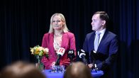 Riikka Purra ja Wille Rydman seisovat tiedotustilaisuudessa.