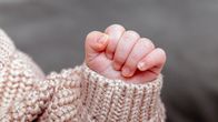 A baby's small hand.