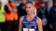 Löpare fotograferas på banan.