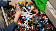 A child playing with Legos.