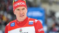 Aleksandr Bolsjunov i närbild. Han har en röd dräkt på sig. 