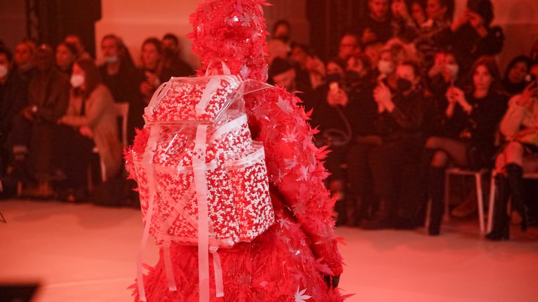 Model on the catwalk, Bag Detail, at the Off White Fashion show in Paris, Fall Winter 2022, Fashion Week Collection designed by Virgil Abloh
