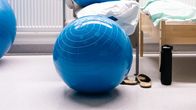 A birthing ball in a hospital delivery room.