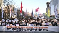 Demonstranter ute på gatan i Seoul. 