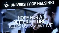  Helsingin yliopiston slogan HOPE FOR A BETTER FUTURE KEEPS US INNOVATIVE messutapahtumassa.