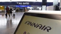 Finnair check-in at Helsinki-Vantaa Airport.