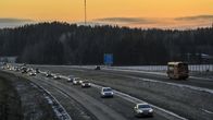 Highway traffic in wintry conditions. 