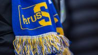 Kaulaliina, jossa Perussuomalaisten tunnus.