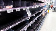 Photo shows an empty supermarket shelf.