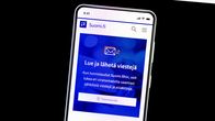 Suomi.fi webpage on a phone screen.