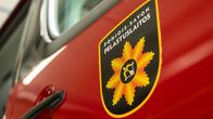 Pohjois-Savon Pelastuslaitoksen logo paloauton kyljessä.
