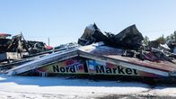 Nord1-marketin kyltti Näätämössä palon jälkeen.