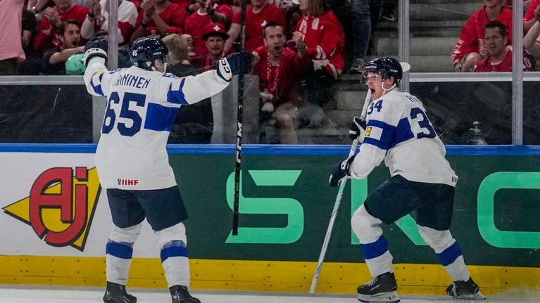 Aatu Raty of Finland (R) celebrates his goal with Sakari Manninen of Finland (L) during the 2026 IIHF Ice Hockey World Championship Switzerland match between Canada and Finland.