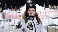 Krista Pärmäkoski ler mot kameran.